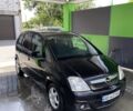 Черный Опель Мерива, объемом двигателя 1.6 л и пробегом 290 тыс. км за 4750 $, фото 1 на Automoto.ua