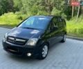 Черный Опель Мерива, объемом двигателя 1.8 л и пробегом 155 тыс. км за 4800 $, фото 1 на Automoto.ua