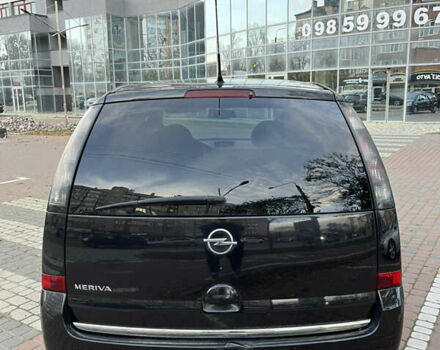 Черный Опель Мерива, объемом двигателя 1.6 л и пробегом 255 тыс. км за 4199 $, фото 7 на Automoto.ua