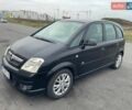 Черный Опель Мерива, объемом двигателя 1.6 л и пробегом 215 тыс. км за 4950 $, фото 1 на Automoto.ua