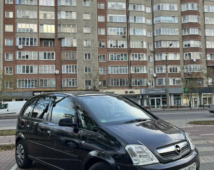 Черный Опель Мерива, объемом двигателя 1.6 л и пробегом 255 тыс. км за 4199 $, фото 2 на Automoto.ua