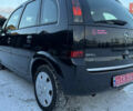 Черный Опель Мерива, объемом двигателя 1.6 л и пробегом 150 тыс. км за 5750 $, фото 5 на Automoto.ua