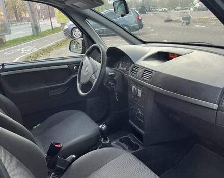 Черный Опель Мерива, объемом двигателя 1.6 л и пробегом 255 тыс. км за 4199 $, фото 14 на Automoto.ua