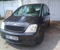 Черный Опель Мерива, объемом двигателя 1.7 л и пробегом 250 тыс. км за 2300 $, фото 1 на Automoto.ua