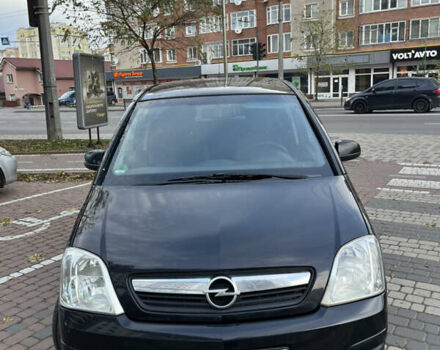 Черный Опель Мерива, объемом двигателя 1.6 л и пробегом 255 тыс. км за 4199 $, фото 1 на Automoto.ua