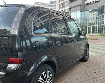 Черный Опель Мерива, объемом двигателя 1.6 л и пробегом 255 тыс. км за 4199 $, фото 5 на Automoto.ua