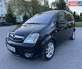 Черный Опель Мерива, объемом двигателя 1.4 л и пробегом 248 тыс. км за 4200 $, фото 1 на Automoto.ua