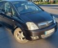 Черный Опель Мерива, объемом двигателя 1.6 л и пробегом 283 тыс. км за 4600 $, фото 1 на Automoto.ua