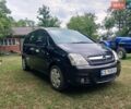 Чорний Опель Меріва, об'ємом двигуна 1.6 л та пробігом 150 тис. км за 4300 $, фото 1 на Automoto.ua