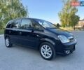 Черный Опель Мерива, объемом двигателя 1.4 л и пробегом 248 тыс. км за 4200 $, фото 6 на Automoto.ua