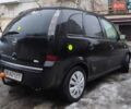 Черный Опель Мерива, объемом двигателя 1.4 л и пробегом 205 тыс. км за 5500 $, фото 7 на Automoto.ua