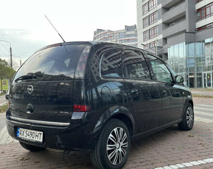 Черный Опель Мерива, объемом двигателя 1.6 л и пробегом 255 тыс. км за 4199 $, фото 6 на Automoto.ua