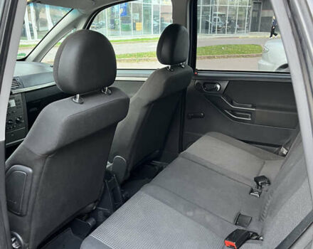 Черный Опель Мерива, объемом двигателя 1.6 л и пробегом 255 тыс. км за 4199 $, фото 11 на Automoto.ua