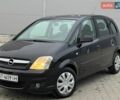 Черный Опель Мерива, объемом двигателя 1.3 л и пробегом 260 тыс. км за 4900 $, фото 1 на Automoto.ua