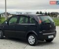 Черный Опель Мерива, объемом двигателя 1.3 л и пробегом 260 тыс. км за 4900 $, фото 5 на Automoto.ua