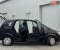 Черный Опель Мерива, объемом двигателя 1.3 л и пробегом 260 тыс. км за 4900 $, фото 37 на Automoto.ua
