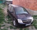 Черный Опель Мерива, объемом двигателя 1.6 л и пробегом 160 тыс. км за 3500 $, фото 1 на Automoto.ua