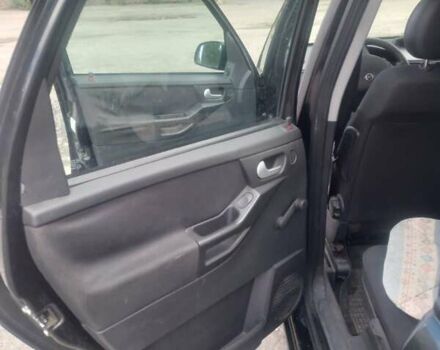 Черный Опель Мерива, объемом двигателя 1.69 л и пробегом 292 тыс. км за 4500 $, фото 7 на Automoto.ua