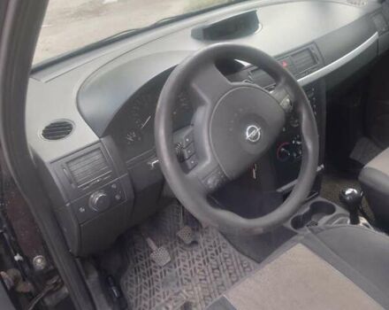 Черный Опель Мерива, объемом двигателя 1.69 л и пробегом 292 тыс. км за 4500 $, фото 5 на Automoto.ua