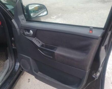 Черный Опель Мерива, объемом двигателя 1.69 л и пробегом 292 тыс. км за 4500 $, фото 4 на Automoto.ua