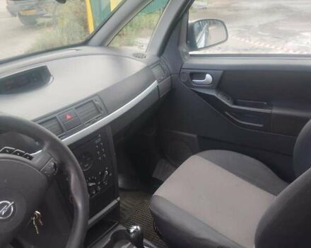 Черный Опель Мерива, объемом двигателя 1.69 л и пробегом 292 тыс. км за 4500 $, фото 3 на Automoto.ua