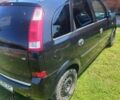 Черный Опель Мерива, объемом двигателя 1.6 л и пробегом 200 тыс. км за 3800 $, фото 1 на Automoto.ua