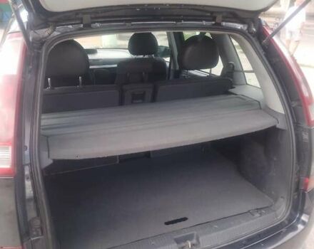 Черный Опель Мерива, объемом двигателя 1.69 л и пробегом 292 тыс. км за 4500 $, фото 8 на Automoto.ua