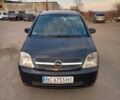 Черный Опель Мерива, объемом двигателя 1.69 л и пробегом 270 тыс. км за 2600 $, фото 1 на Automoto.ua
