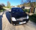 Черный Опель Мерива, объемом двигателя 1.6 л и пробегом 136 тыс. км за 3100 $, фото 1 на Automoto.ua