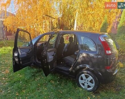 Черный Опель Мерива, объемом двигателя 1.6 л и пробегом 208 тыс. км за 3900 $, фото 3 на Automoto.ua