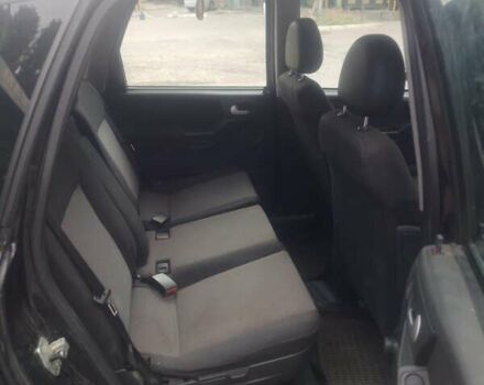 Черный Опель Мерива, объемом двигателя 1.69 л и пробегом 292 тыс. км за 4500 $, фото 6 на Automoto.ua