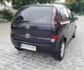 Чорний Опель Меріва, об'ємом двигуна 1.25 л та пробігом 151 тис. км за 3800 $, фото 1 на Automoto.ua