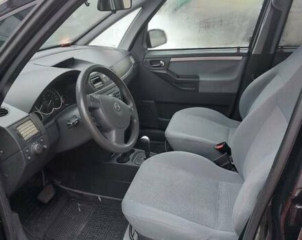 Черный Опель Мерива, объемом двигателя 1.6 л и пробегом 200 тыс. км за 4900 $, фото 8 на Automoto.ua