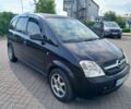 Черный Опель Мерива, объемом двигателя 1.6 л и пробегом 231 тыс. км за 3400 $, фото 1 на Automoto.ua