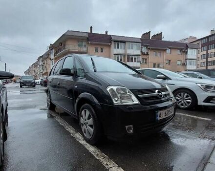 Черный Опель Мерива, объемом двигателя 1.6 л и пробегом 200 тыс. км за 4900 $, фото 9 на Automoto.ua