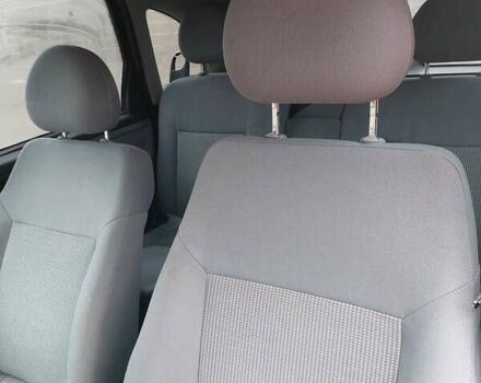 Черный Опель Мерива, объемом двигателя 1.6 л и пробегом 200 тыс. км за 4900 $, фото 1 на Automoto.ua