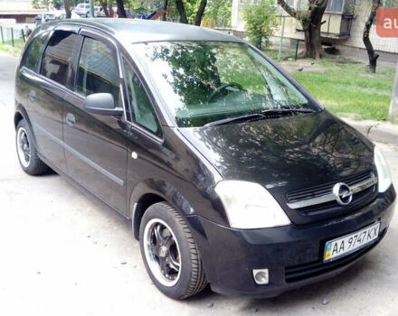 Черный Опель Мерива, объемом двигателя 1.6 л и пробегом 185 тыс. км за 4700 $, фото 1 на Automoto.ua