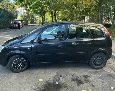 Черный Опель Мерива, объемом двигателя 1.6 л и пробегом 228 тыс. км за 4500 $, фото 3 на Automoto.ua