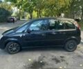 Черный Опель Мерива, объемом двигателя 1.6 л и пробегом 228 тыс. км за 4500 $, фото 3 на Automoto.ua
