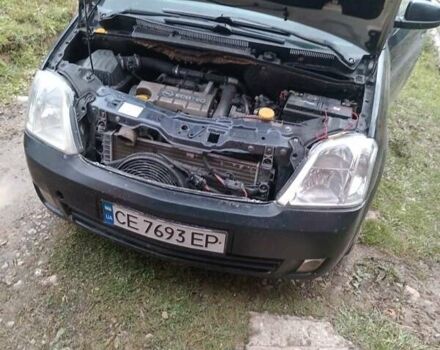 Черный Опель Мерива, объемом двигателя 1.69 л и пробегом 240 тыс. км за 2800 $, фото 6 на Automoto.ua