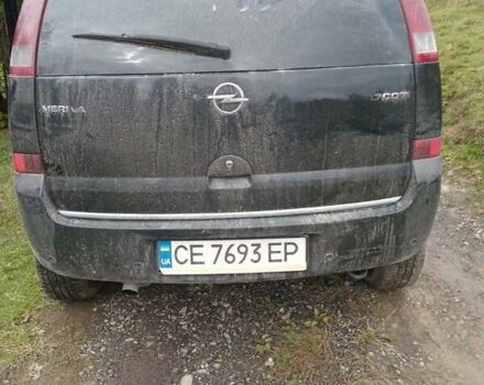 Черный Опель Мерива, объемом двигателя 1.69 л и пробегом 240 тыс. км за 2800 $, фото 1 на Automoto.ua