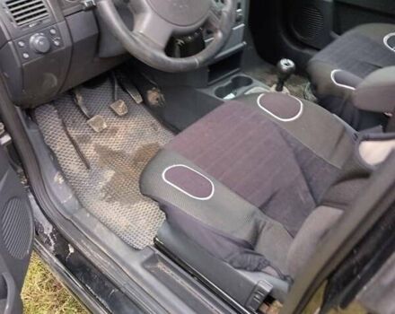 Черный Опель Мерива, объемом двигателя 1.69 л и пробегом 240 тыс. км за 2800 $, фото 9 на Automoto.ua