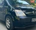 Черный Опель Мерива, объемом двигателя 1.6 л и пробегом 230 тыс. км за 4090 $, фото 3 на Automoto.ua