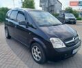 Черный Опель Мерива, объемом двигателя 1.6 л и пробегом 230 тыс. км за 4100 $, фото 1 на Automoto.ua