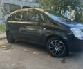 Черный Опель Мерива, объемом двигателя 1.6 л и пробегом 228 тыс. км за 4500 $, фото 4 на Automoto.ua
