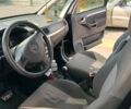 Черный Опель Мерива, объемом двигателя 1.6 л и пробегом 231 тыс. км за 3400 $, фото 5 на Automoto.ua