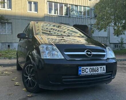 Черный Опель Мерива, объемом двигателя 1.6 л и пробегом 228 тыс. км за 4500 $, фото 1 на Automoto.ua