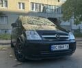 Черный Опель Мерива, объемом двигателя 1.6 л и пробегом 228 тыс. км за 4500 $, фото 1 на Automoto.ua