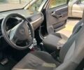Черный Опель Мерива, объемом двигателя 1.6 л и пробегом 230 тыс. км за 4100 $, фото 4 на Automoto.ua
