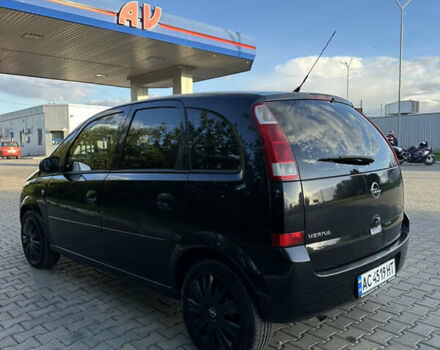 Черный Опель Мерива, объемом двигателя 1.6 л и пробегом 225 тыс. км за 4600 $, фото 4 на Automoto.ua
